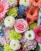 Colorful flower arrangement with gerberas, gladiolus, delphinium, hydrangea and roses in Chicago