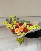 Peach and green flower bouquet with gerberas, roses, chrysanthemums and gladiolus in Chicago