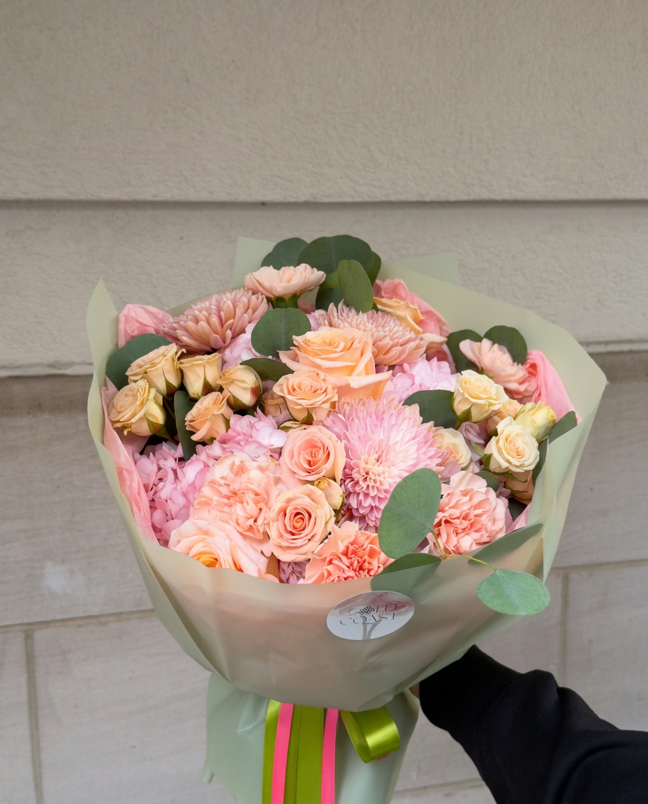 Peach and pink rose bouquet with chrysanthemums, carnations and eucalyptus in Chicago