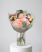 Peach and pink rose bouquet with chrysanthemums, carnations and eucalyptus in Chicago
